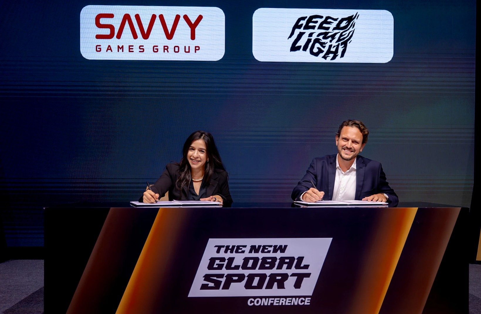 Feed Me Light × Savvy Games Group signing